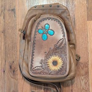 Stylish Brown Myra Crossbody Bag with Floral and Turquoise Details
